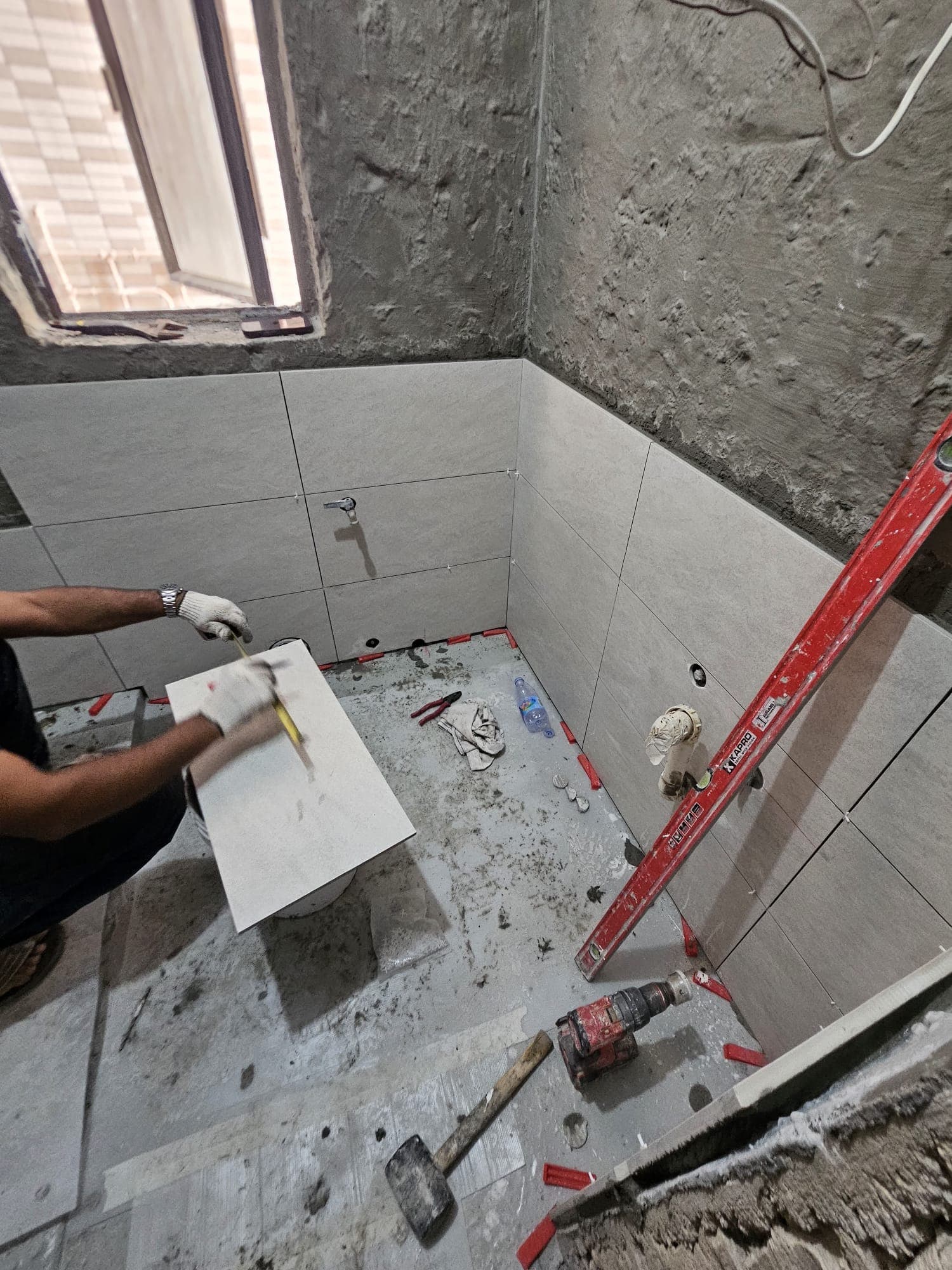 Before: bathroom tiling work